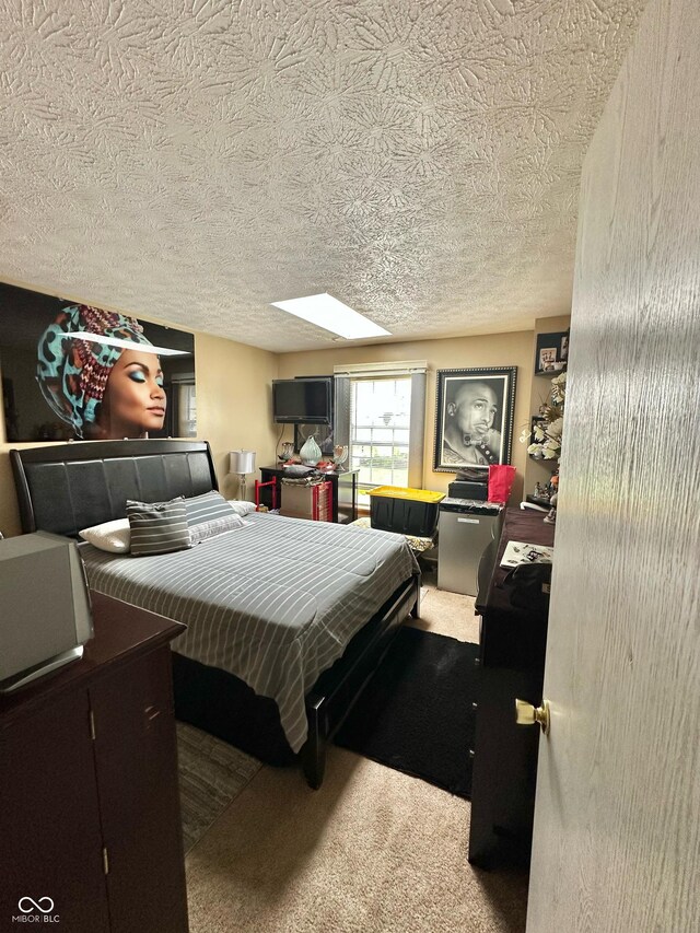 1831 Beckenbauer Ln, Indianapolis, IN 46214 - carpeted bedroom with a skylight and a textured ceiling