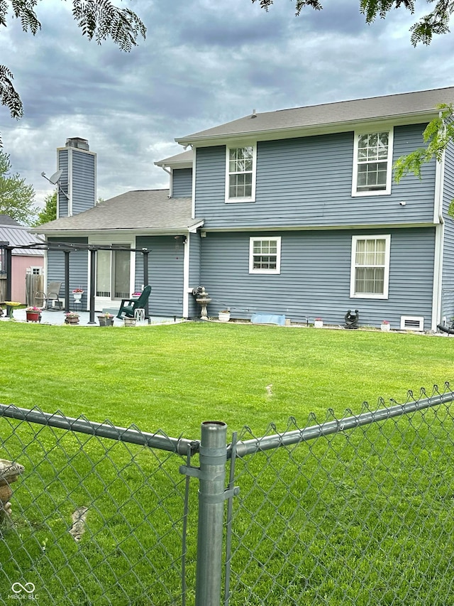 1831 Beckenbauer Ln, Indianapolis, IN 46214 - rear view of house featuring a chimney and a patio area