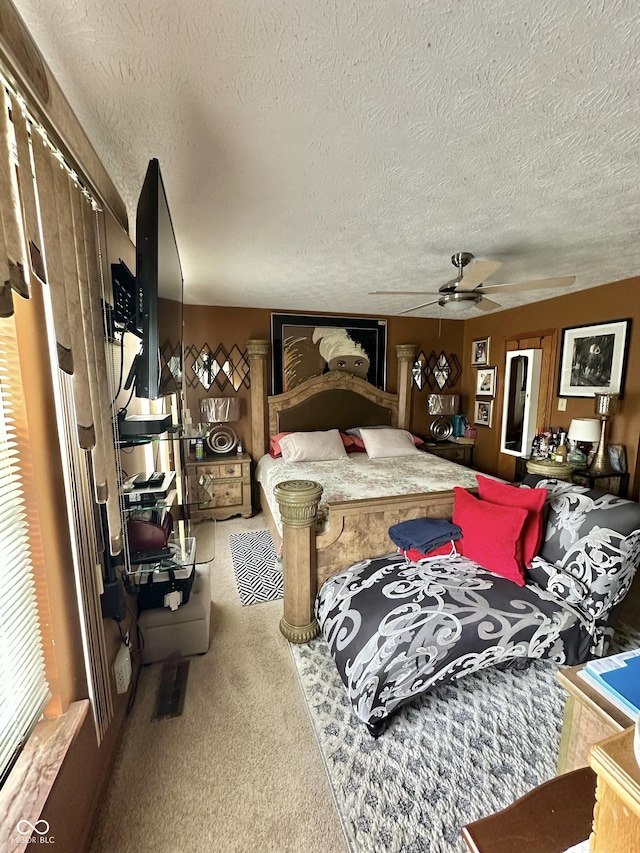 1831 Beckenbauer Ln, Indianapolis, IN 46214 - carpeted bedroom featuring a textured ceiling and a ceiling fan