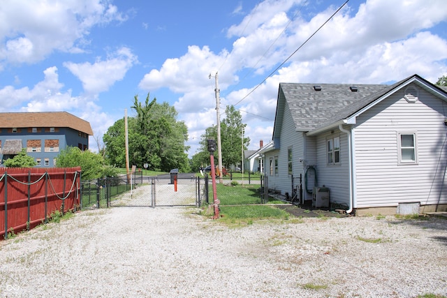 202 S Church St, Brooklyn, IN 46111 - view of dirt / gravel road with a gate and a gated entry