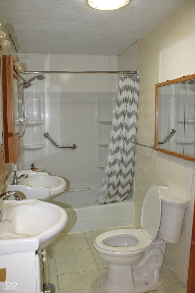 202 S Church St, Brooklyn, IN 46111 - full bathroom with toilet, tile patterned flooring, shower / bath combination with curtain, and vanity