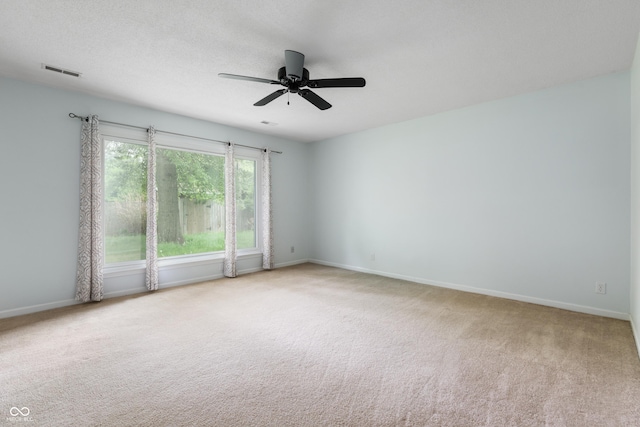 4904 N Tillotson Ave, Muncie, IN 47304 - carpeted spare room featuring a ceiling fan and baseboards