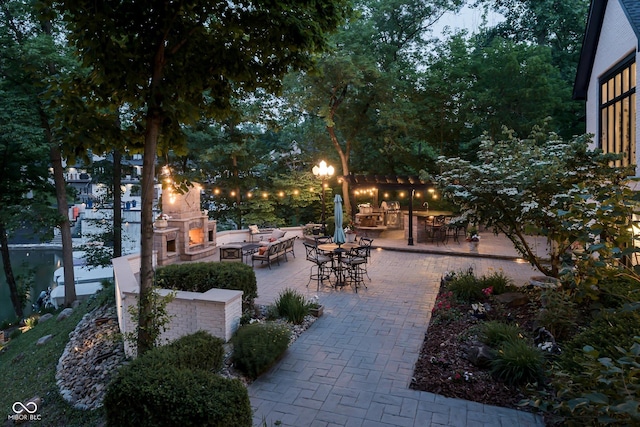 8301 Reef Ct, Indianapolis, IN 46236 - view of patio / terrace with an outdoor stone fireplace and outdoor dining space