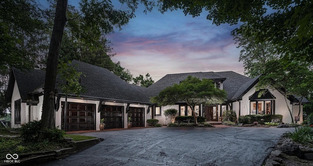 8301 Reef Ct, Indianapolis, IN 46236 - view of front of house with asphalt driveway, a garage, and a shingled roof