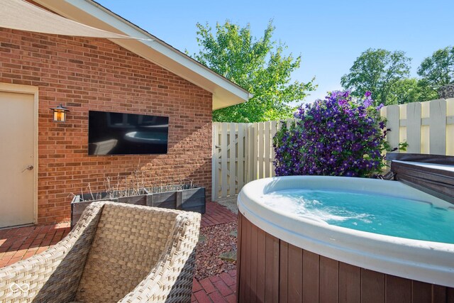 3975 Offshore Dr, Columbus, IN 47203 - view of patio featuring a hot tub