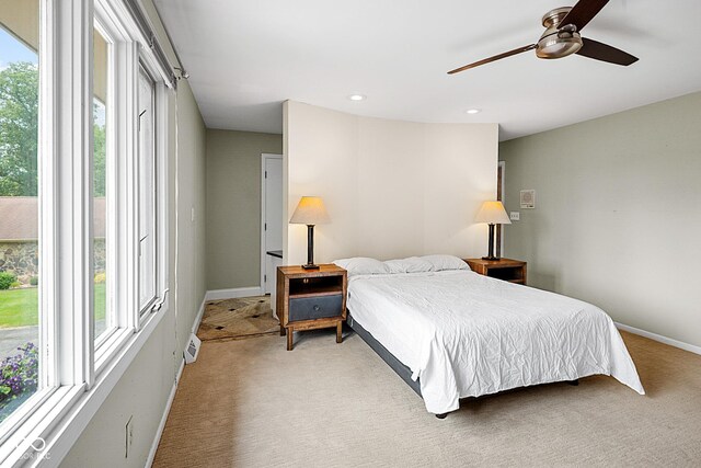 3975 Offshore Dr, Columbus, IN 47203 - bedroom with light carpet, baseboards, ceiling fan, and recessed lighting