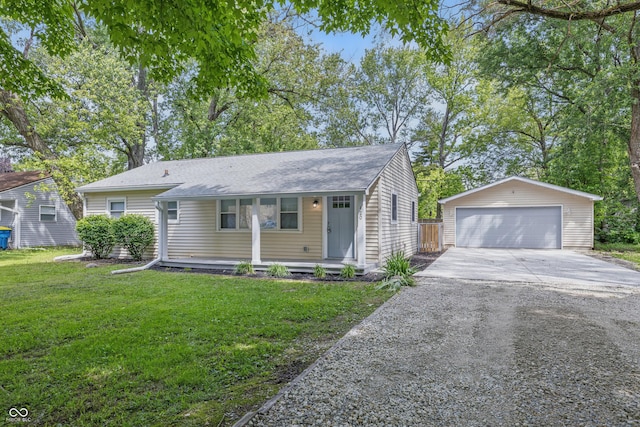 420 Vista Dr, Carmel, IN 46280 - view of front of property featuring an outdoor structure, a detached garage, a front yard, and roof with shingles