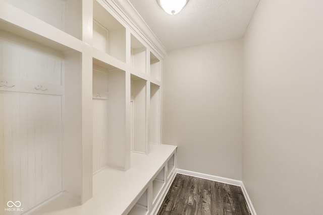 13050 Grand Vue Dr, Carmel, IN 46032 - mudroom with dark wood-style flooring and baseboards
