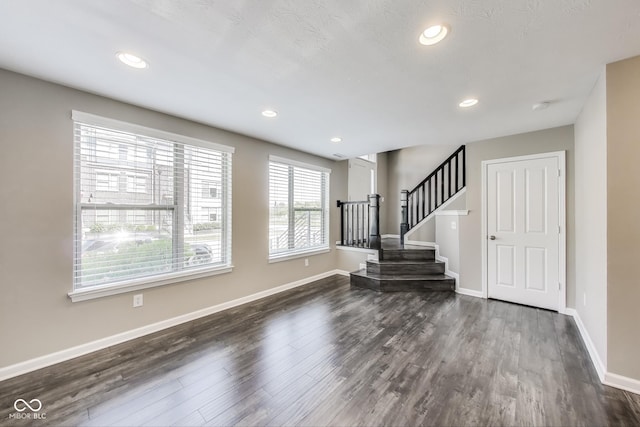 13050 Grand Vue Dr, Carmel, IN 46032 - entryway featuring dark wood-style floors, stairway, baseboards, and recessed lighting