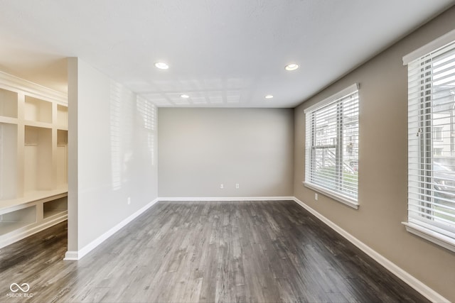 13050 Grand Vue Dr, Carmel, IN 46032 - empty room featuring wood finished floors, recessed lighting, and baseboards
