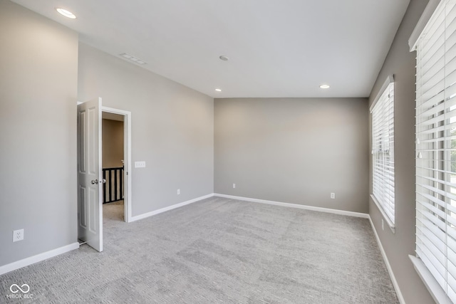 13050 Grand Vue Dr, Carmel, IN 46032 - carpeted empty room with baseboards and recessed lighting