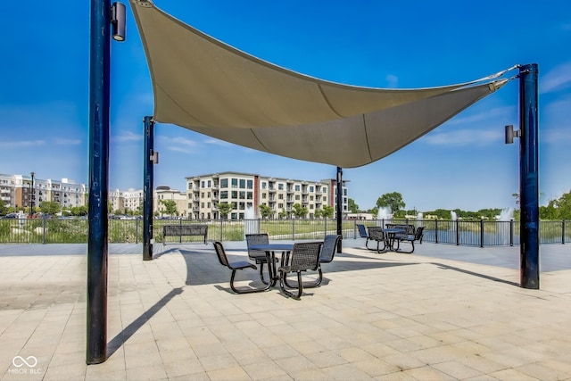 13050 Grand Vue Dr, Carmel, IN 46032 - view of property's community featuring a patio and outdoor dining space