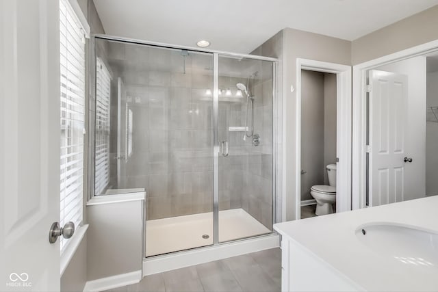 13050 Grand Vue Dr, Carmel, IN 46032 - full bath with toilet, a stall shower, and vanity