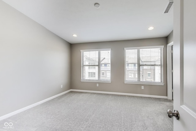 13050 Grand Vue Dr, Carmel, IN 46032 - carpeted empty room featuring baseboards and recessed lighting