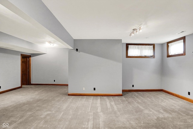 1850 Longest Dr, Franklin, IN 46131 - basement featuring carpet floors, baseboards, and rail lighting