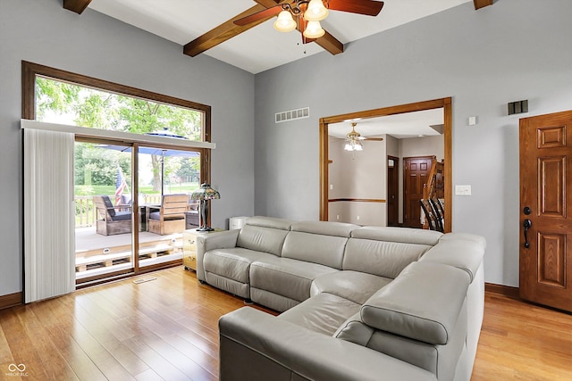 1850 Longest Dr, Franklin, IN 46131 - living room with ceiling fan, beamed ceiling, light wood-type flooring, a towering ceiling, and baseboards