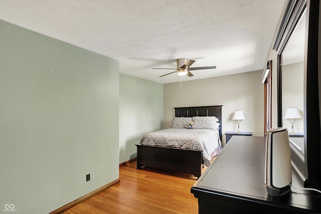 1850 Longest Dr, Franklin, IN 46131 - bedroom with light wood-type flooring, baseboards, and ceiling fan
