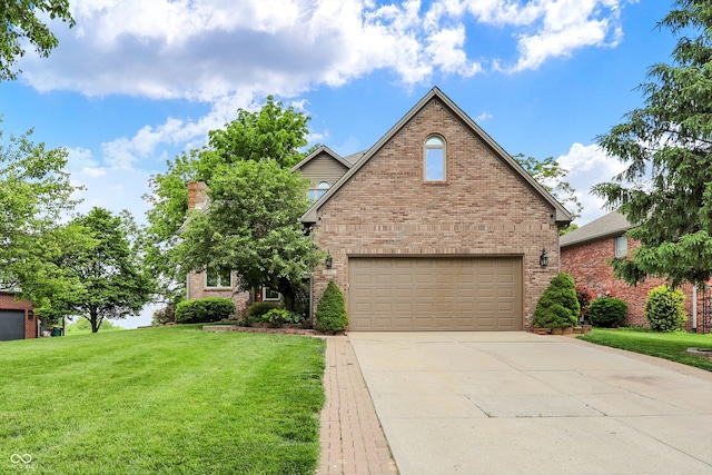 1850 Longest Dr, Franklin, IN 46131 - view of front facade with a front lawn, brick siding, an attached garage, and driveway