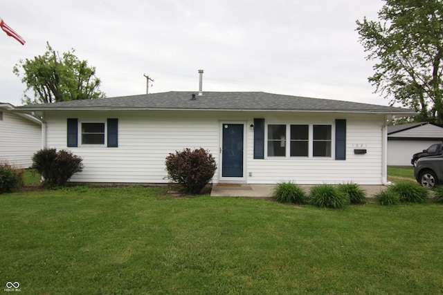 1021 Harney Dr, Lebanon, IN 46052 - ranch-style house featuring a front lawn and roof with shingles