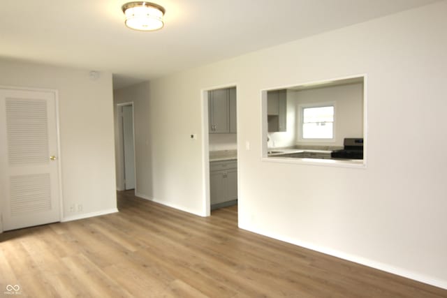 1021 Harney Dr, Lebanon, IN 46052 - unfurnished room with light wood finished floors and baseboards