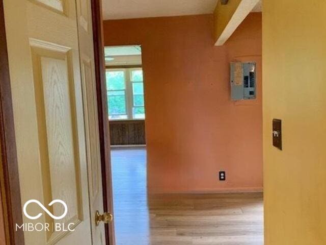 1998 Crescent St, Franklin, IN 46131 - corridor featuring light wood-type flooring, electric panel, and baseboards