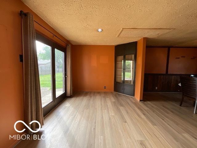 1998 Crescent St, Franklin, IN 46131 - spare room with light wood-style floors and a textured ceiling