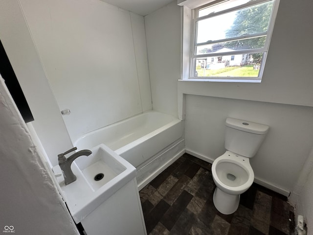 2310 E Raymond St, Indianapolis, IN 46203 - bathroom featuring toilet and baseboards