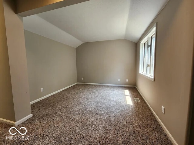 70 Lookout Ridge Dr, Columbus, IN 47201 - additional living space with carpet, vaulted ceiling, and baseboards