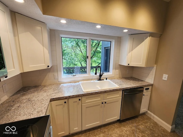 70 Lookout Ridge Dr, Columbus, IN 47201 - kitchen with stainless steel appliances, a sink, white cabinets, backsplash, and recessed lighting