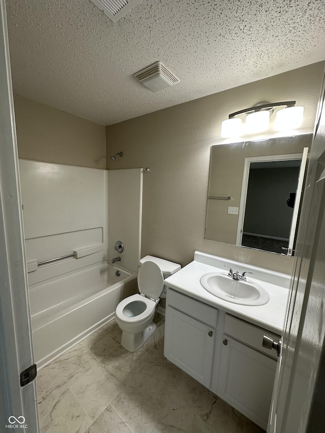 3861 Candle Berry Dr, Indianapolis, IN 46235 - bathroom with vanity, bathtub / shower combination, marble look tiles, and a textured ceiling