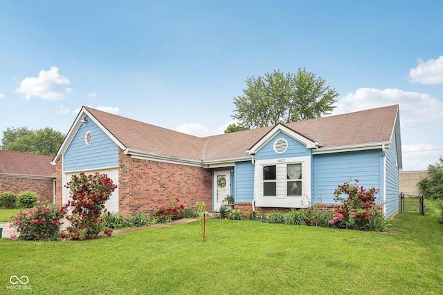 6627 Cobden Ct, Indianapolis, IN 46254 - ranch-style home featuring an attached garage, a front yard, and brick siding