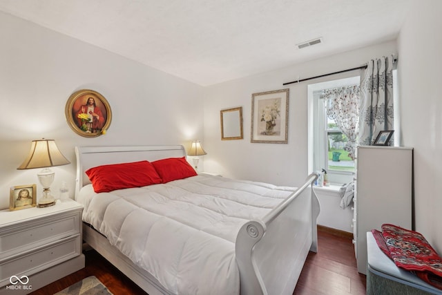 6627 Cobden Ct, Indianapolis, IN 46254 - bedroom featuring dark wood finished floors