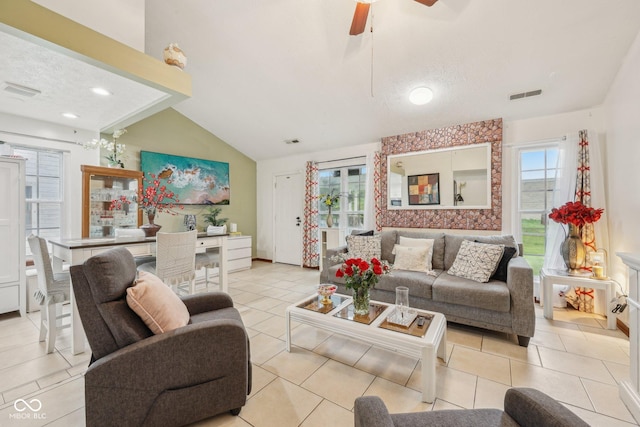 6627 Cobden Ct, Indianapolis, IN 46254 - living room featuring lofted ceiling, ceiling fan, light tile patterned floors, and recessed lighting