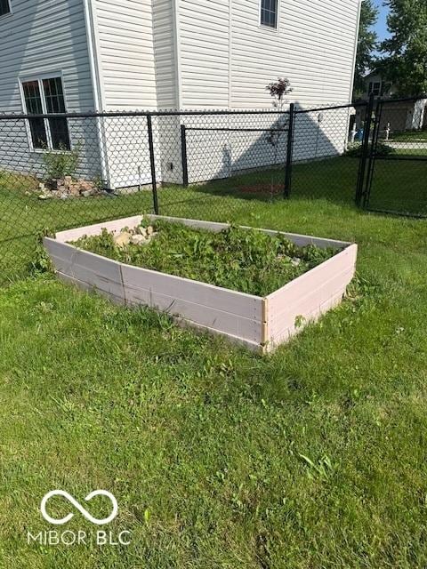 7549 Stockard St, Indianapolis, IN 46239 - view of yard featuring a vegetable garden