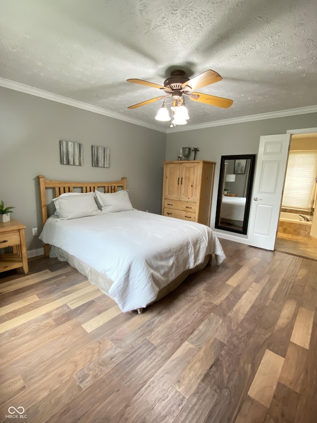 12231 Valley View Cir, Indianapolis, IN 46229 - bedroom with light wood-type flooring, ornamental molding, baseboards, ceiling fan, and a textured ceiling