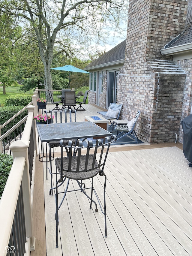 12231 Valley View Cir, Indianapolis, IN 46229 - deck featuring outdoor dining space and grilling area