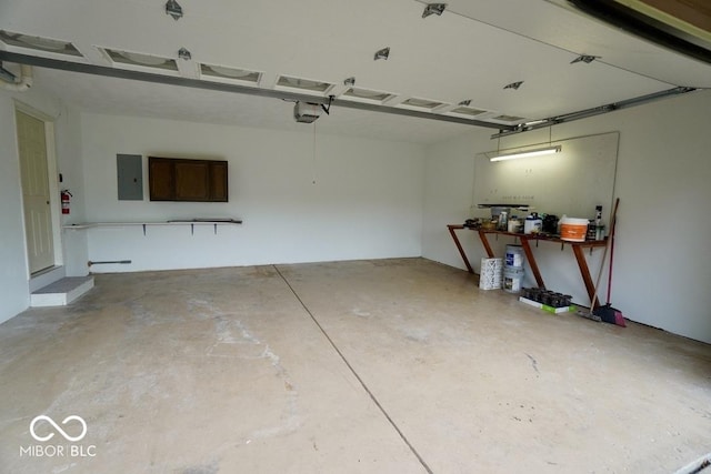 5331 Birch Ln, Greenwood, IN 46143 - garage with electric panel and a garage door opener