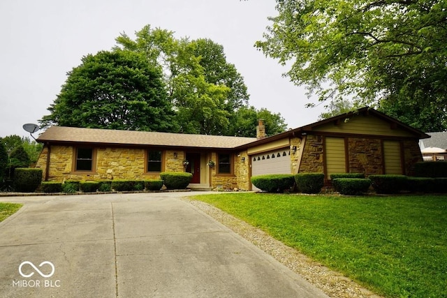 5331 Birch Ln, Greenwood, IN 46143 - single story home with stone siding, a garage, a front yard, and driveway