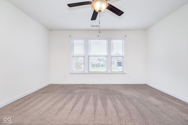 107 Elliott Ave, Trafalgar, IN 46181 - empty room with baseboards, carpet flooring, and a ceiling fan