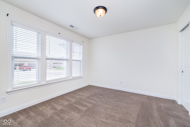 107 Elliott Ave, Trafalgar, IN 46181 - carpeted spare room featuring baseboards