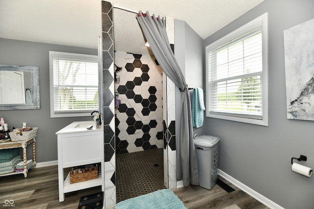 5190 N State Road 213, Windfall, IN 46076 - bathroom with a walk in shower, wood finished floors, vanity, baseboards, and toilet