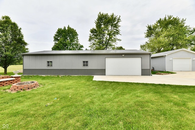 5190 N State Road 213, Windfall, IN 46076 - view of front of home featuring a fire pit, a garage, and an outbuilding