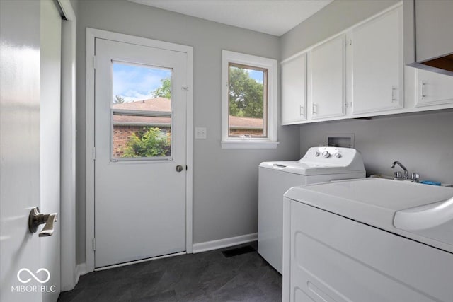 601 Woodbine, Terre Haute, IN 47803 - washroom with cabinet space, baseboards, independent washer and dryer, and dark carpet