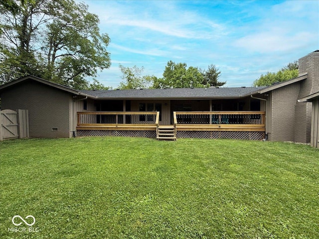 601 Woodbine, Terre Haute, IN 47803 - rear view of house featuring a lawn, brick siding, a wooden deck, and crawl space