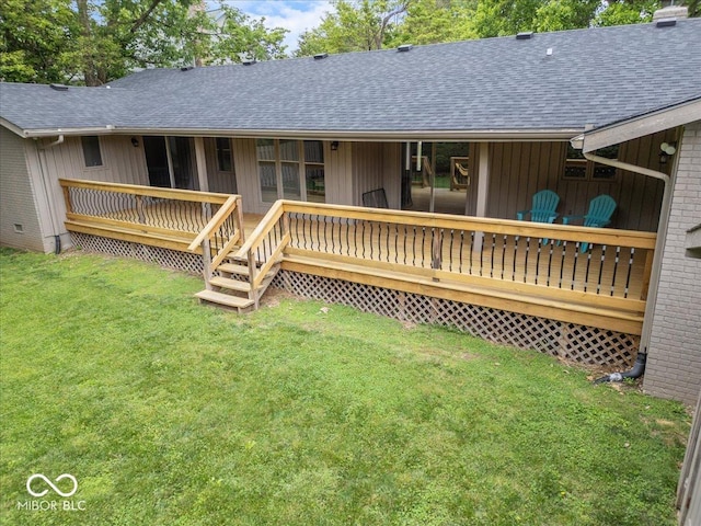601 Woodbine, Terre Haute, IN 47803 - back of property with a shingled roof, a lawn, and board and batten siding