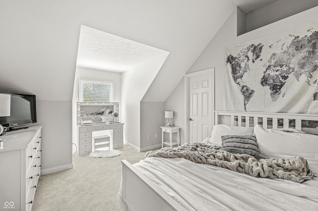 10697 Woodmont Ln, Fishers, IN 46037 - bedroom with vaulted ceiling, light colored carpet, and baseboards