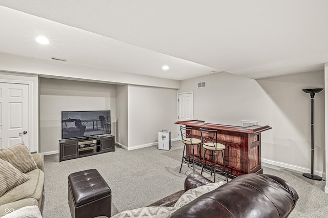 10697 Woodmont Ln, Fishers, IN 46037 - living area featuring a bar, carpet, baseboards, and recessed lighting