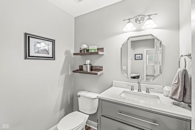 10697 Woodmont Ln, Fishers, IN 46037 - half bath with toilet, vanity, and baseboards
