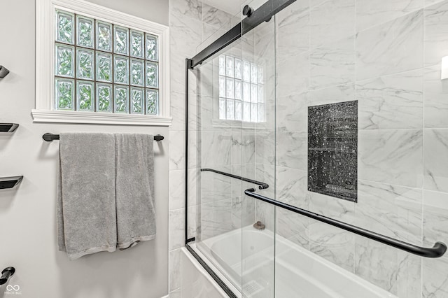 10697 Woodmont Ln, Fishers, IN 46037 - full bath with bath / shower combo with glass door and healthy amount of natural light