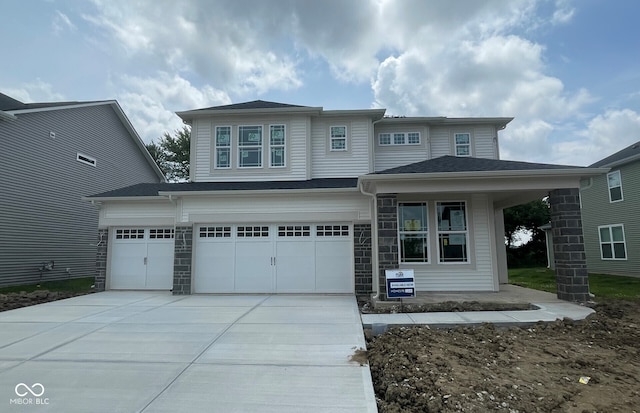 6761 Seabiscuit Rd, Whitestown, IN 46075 - view of front facade featuring concrete driveway, an attached garage, and a garage